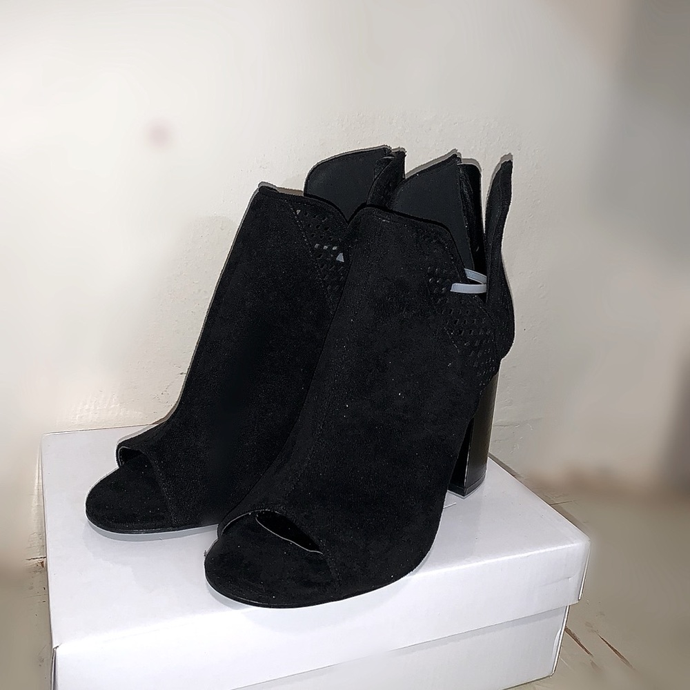 Heeled open toed boots